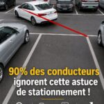 Femme souriante se préparant à se garer avec confiance dans un parking