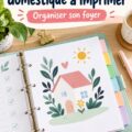 Un classeur coloré ouvert avec des feuilles organisées pour la gestion quotidienne de la maison.