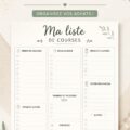 Illustration d'une liste de courses imprimable sur une table en bois.